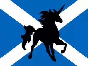 Un unicornio cabalaga sobre la bandera de Escocia
